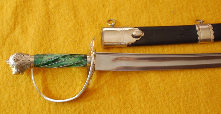 Officer hanger, lion head, pierced quillion and guard, spiral grip